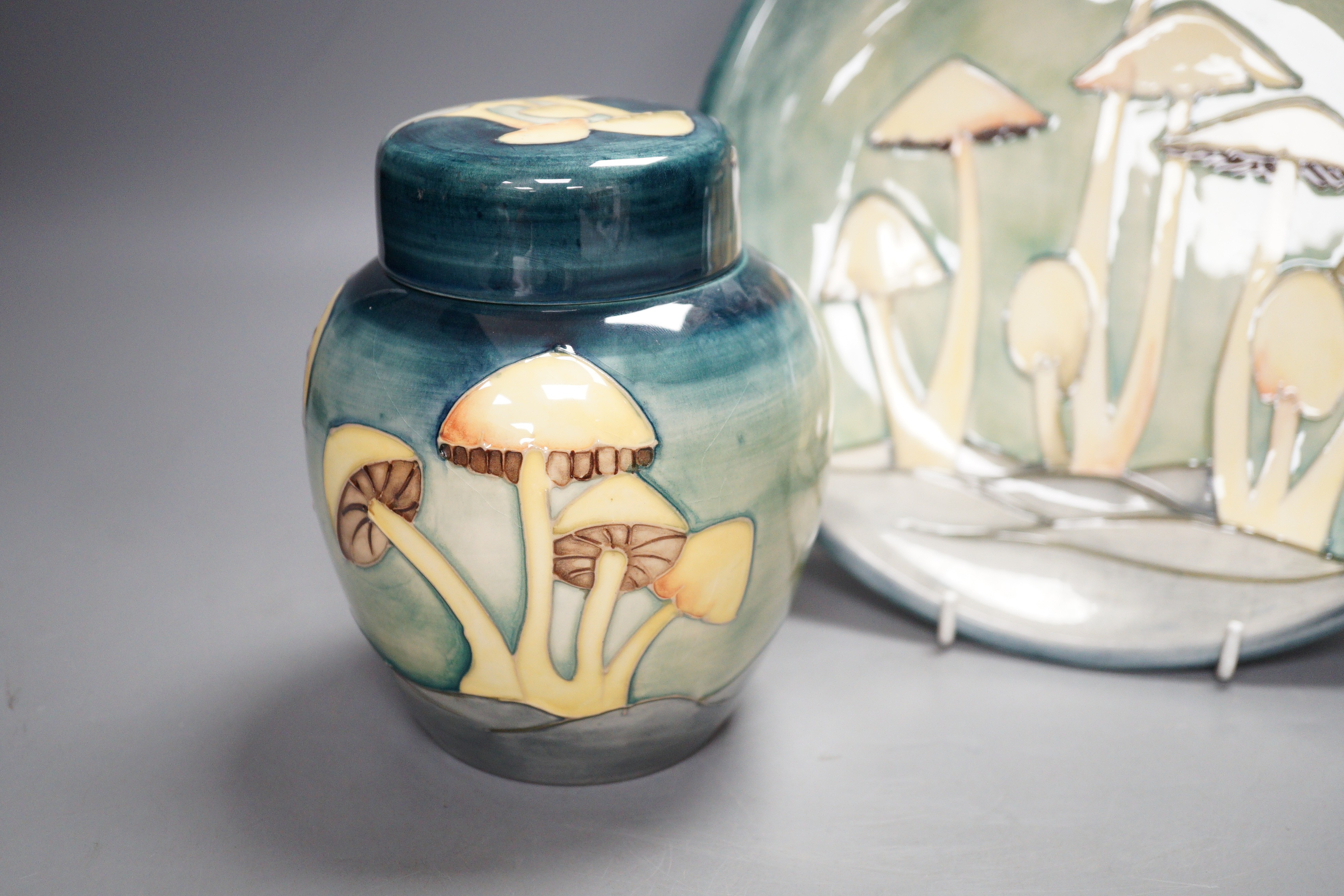 A Moorcroft pottery dish and ginger jar and cover, each decorated with the 